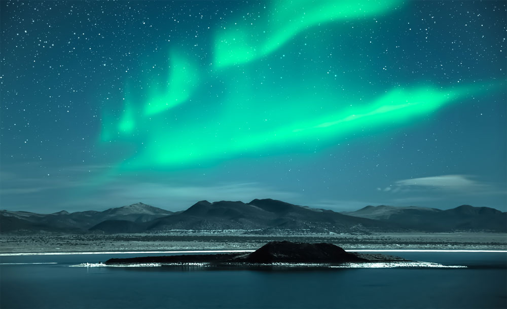 What causes the Aurora Borealis?