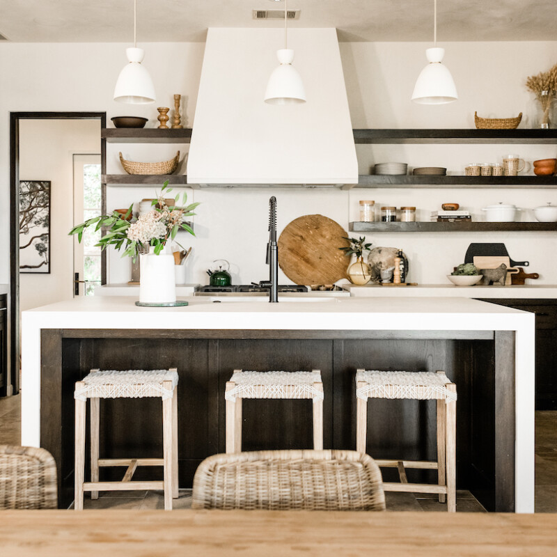 neutral white kitchen with plaster hood