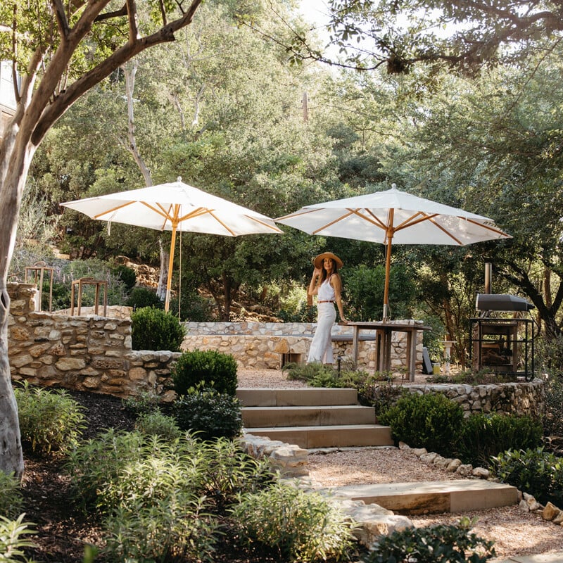 backyard landscaping ideas umbrellas in a mediterranean yard