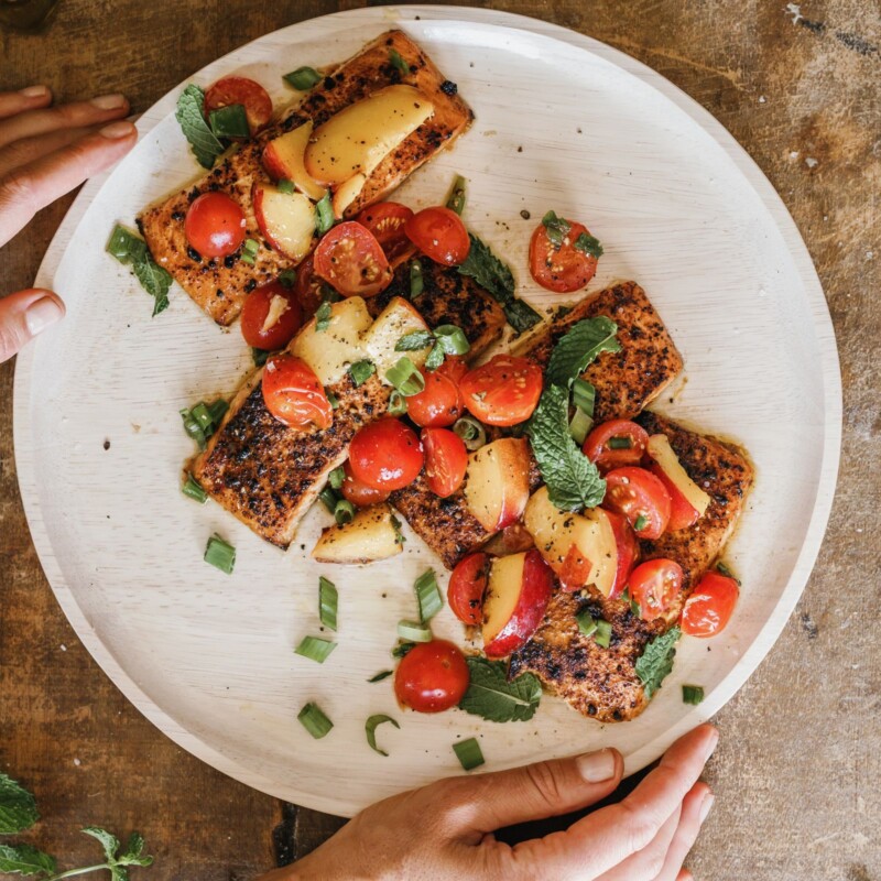 grilled plank salmon on white plate