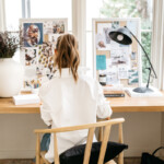 Camille at her desk