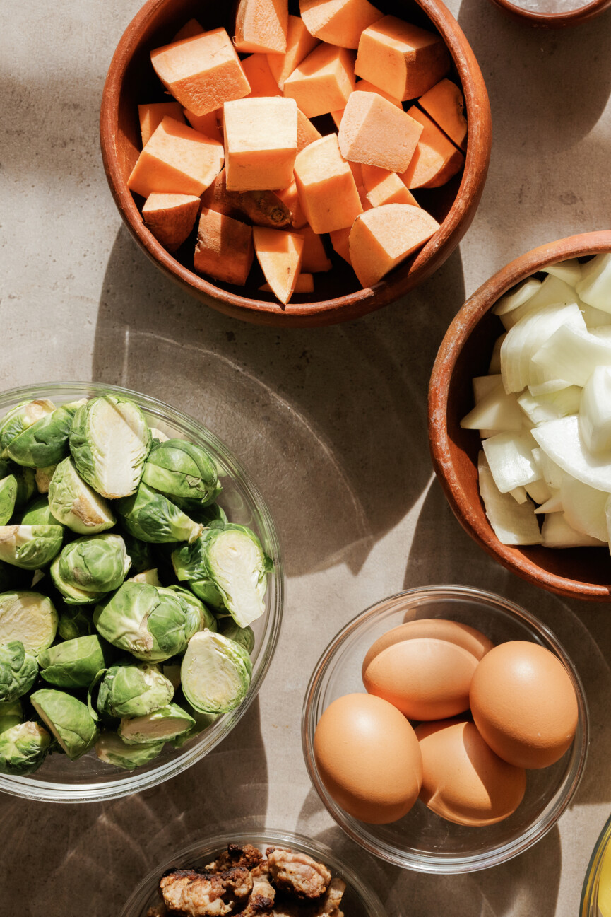 sheet pan harvest hash with sweet potatoes, brussels sprouts, and sausage - ingredients - vegetables - winter produce