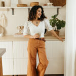 Woman drinking coffee in a coffee nook_healthy energy drinks