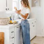 Woman making glass of sexy water.