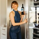 woman with wine for first time dinner party